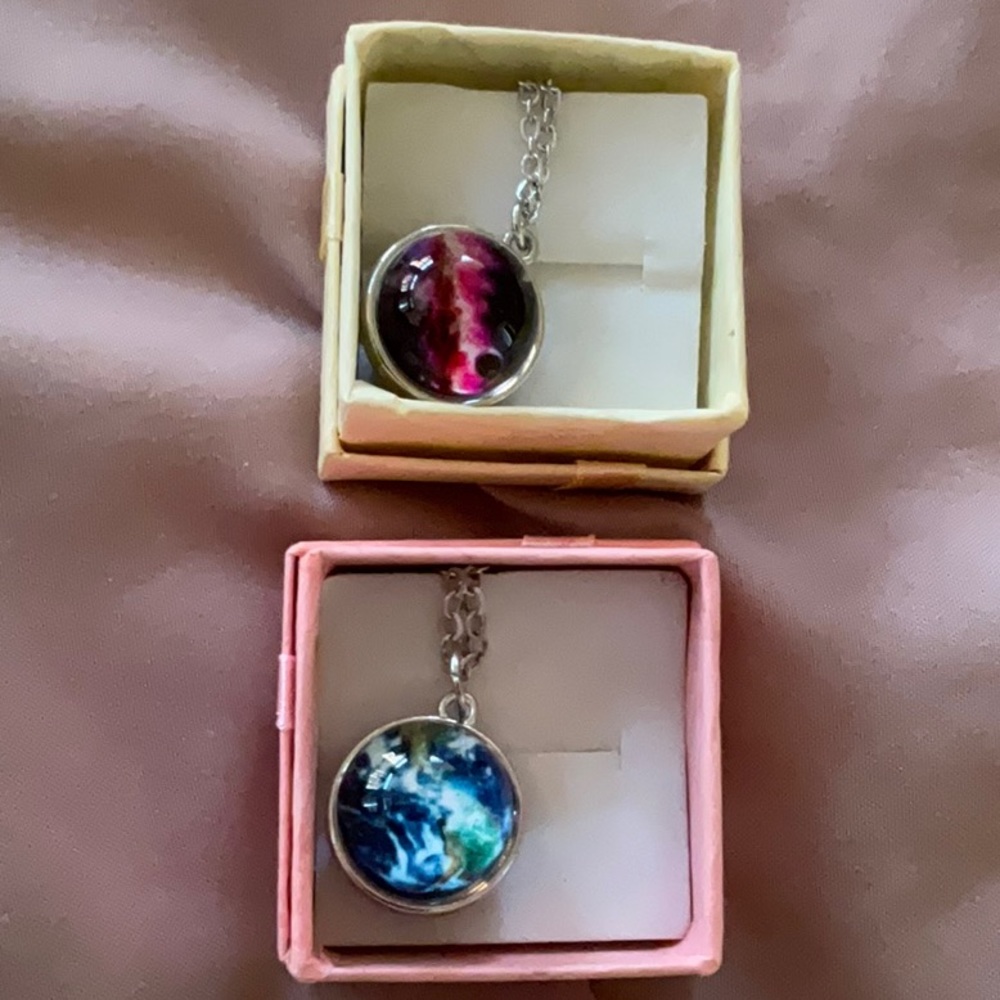 2 planet necklaces in gift boxes